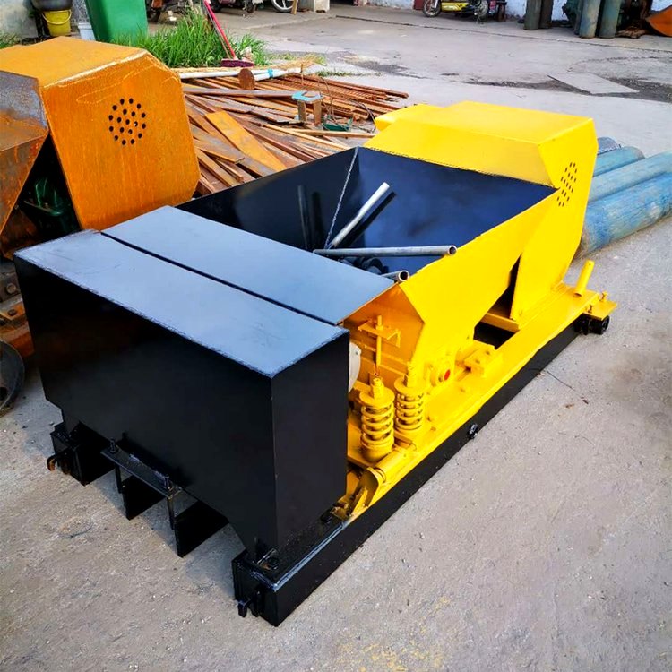 Concrete purlin forming machine with mould and vibration unit on a workshop floor
